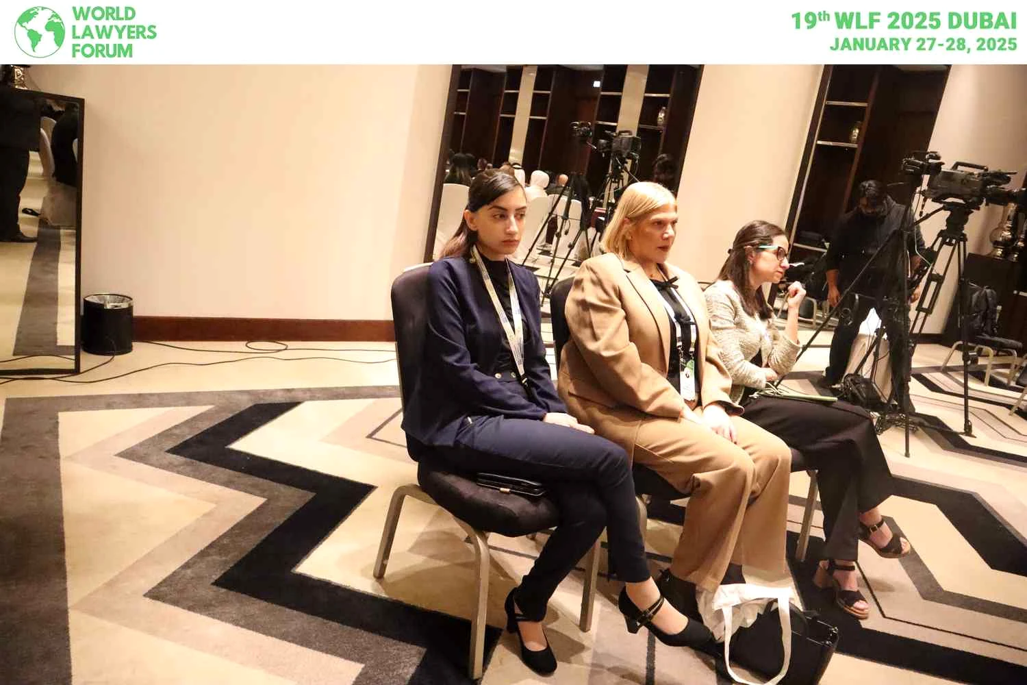 Panelists speaking at WLF Dubai 2025